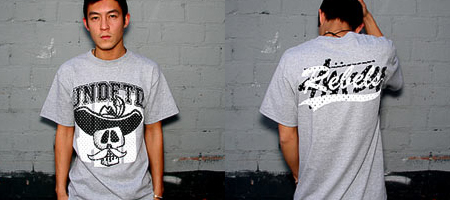 UNDFTD x Stussy – Running Rebels Tee